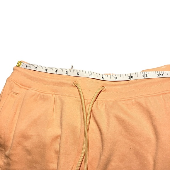 Alphalete NWPT L & S Essential Core women’s athletic shorts light orange - Picture 4 of 13